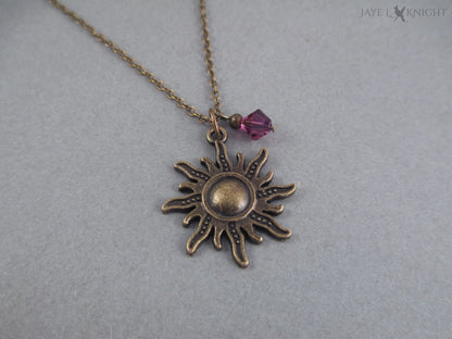 Rapunzel Bronze Sun Charm Necklace